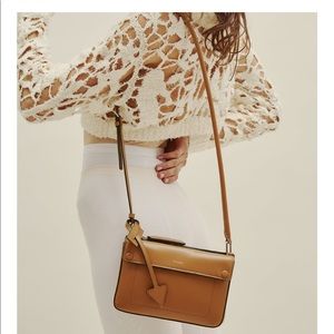 Delroq Troisieme crossbody pouch